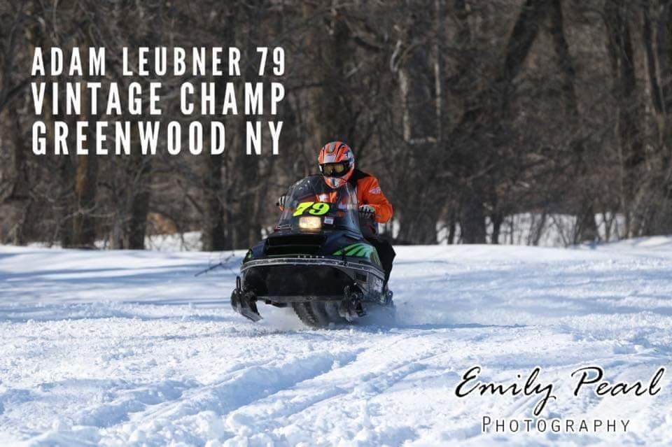 Adam Leubner racing his number 79 vintage Arctic Cat on snow at Greenwood, New York